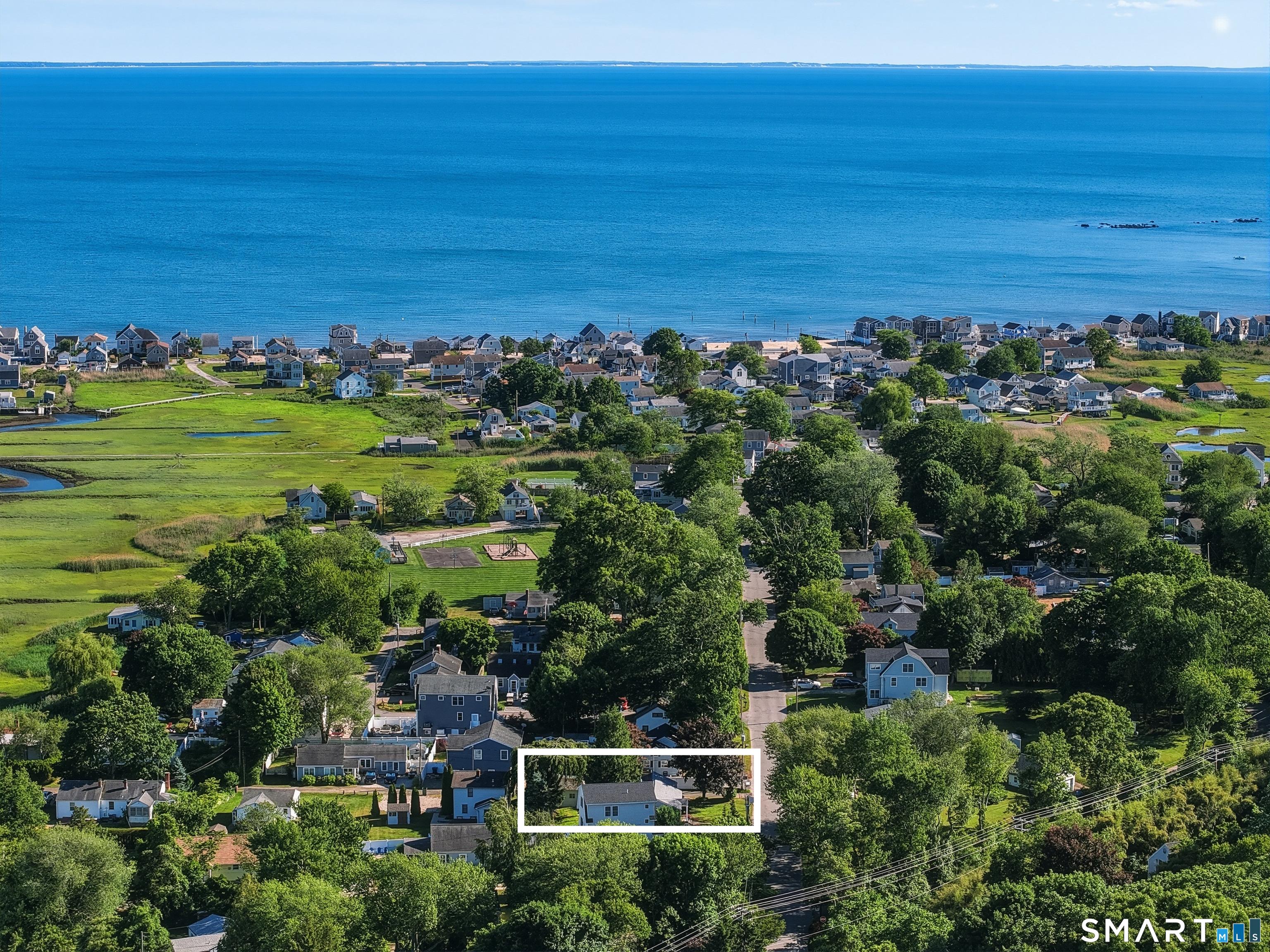 Image 1: Walk down the street or take your golf cart right to the association beach!