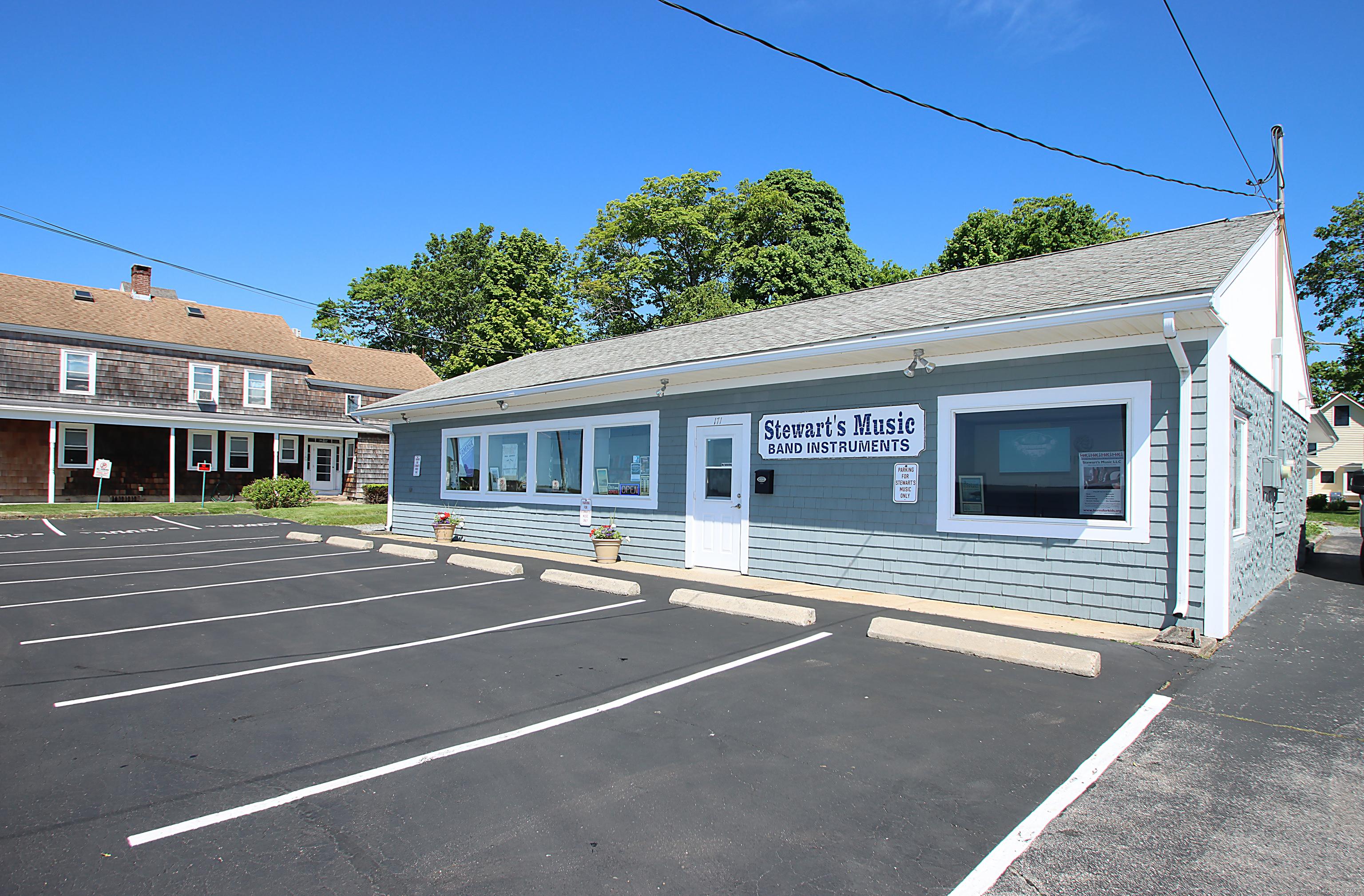 Image 2: one of the few properties on Main Street with on-site parking