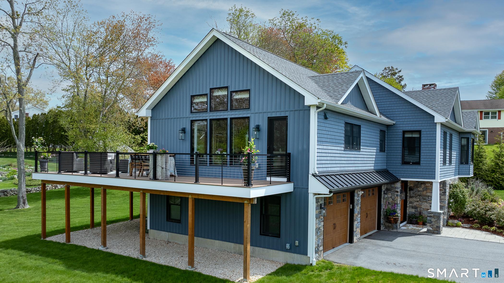 Image 2Side of Structure: Large TimberTech wrap around deck to enjoy the Niantic River views