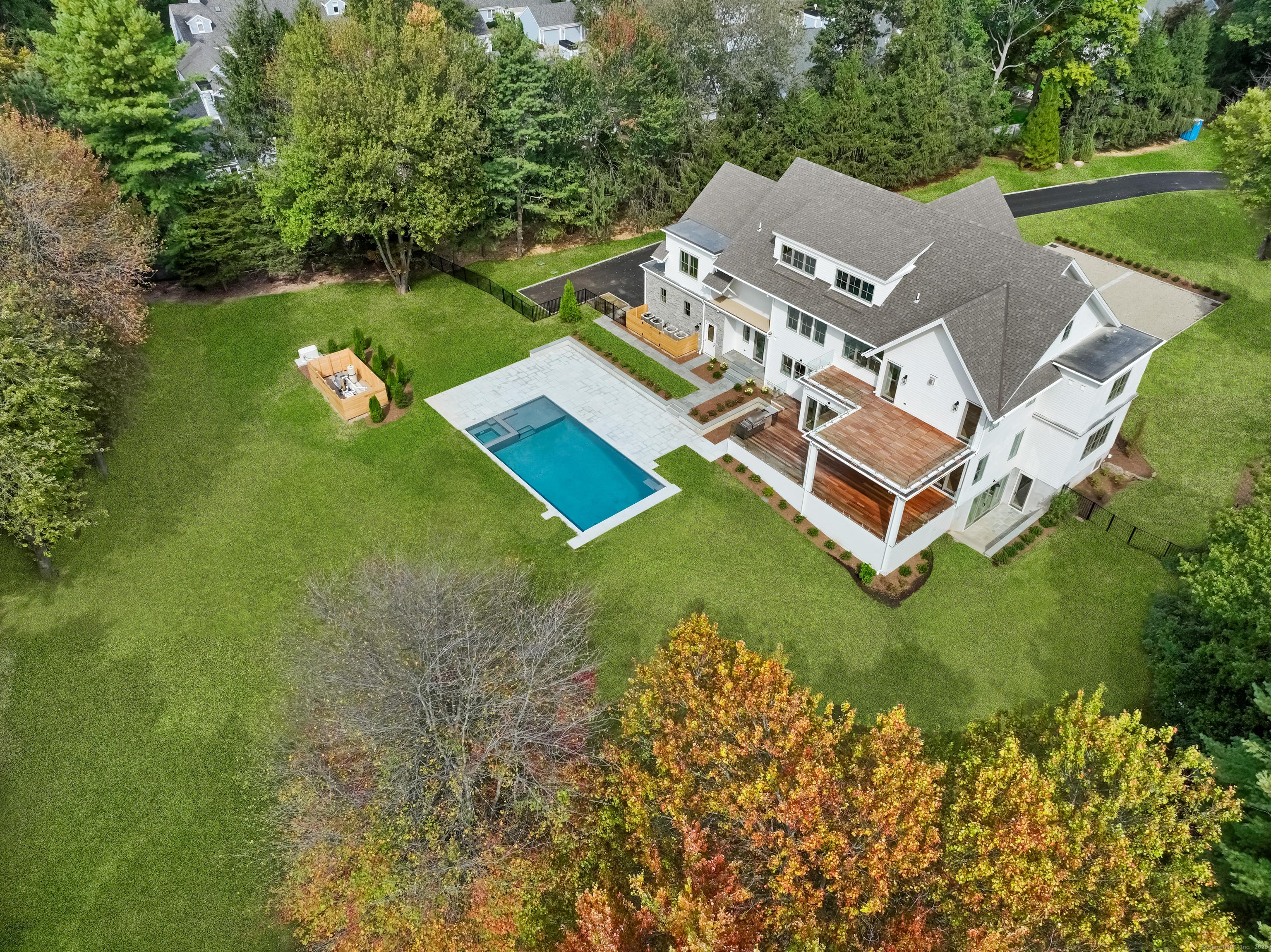 Image 3Aerial View: Spacious back yard with pool and opportunity for sport court