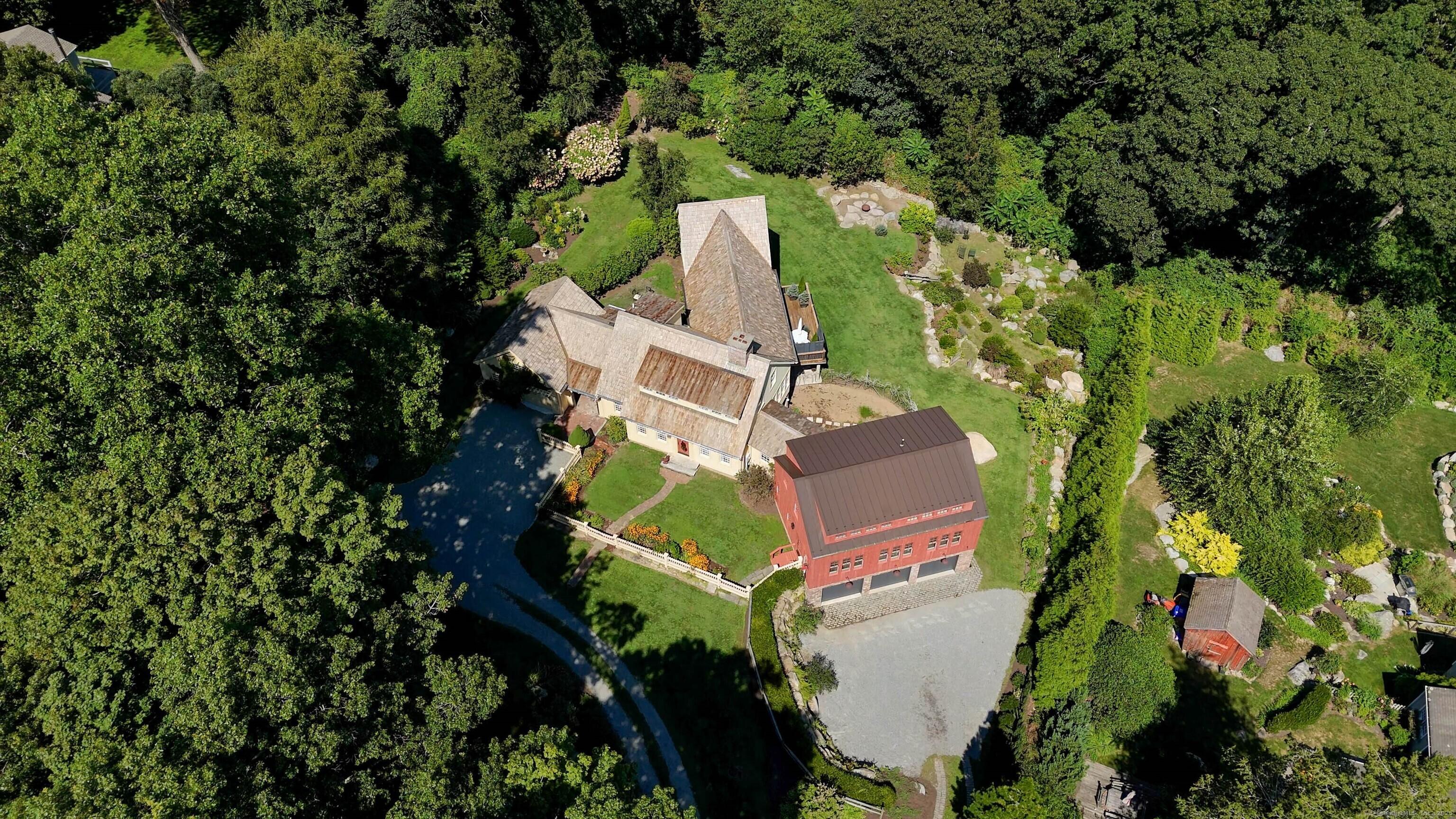 Image 3: AERIAL OF HOME AND STUNNING GARDENS. DO YOU WANT A POOL? WE RESERVED THE PERFECT SPOT STEPS OUT THE FRENCH DOORS