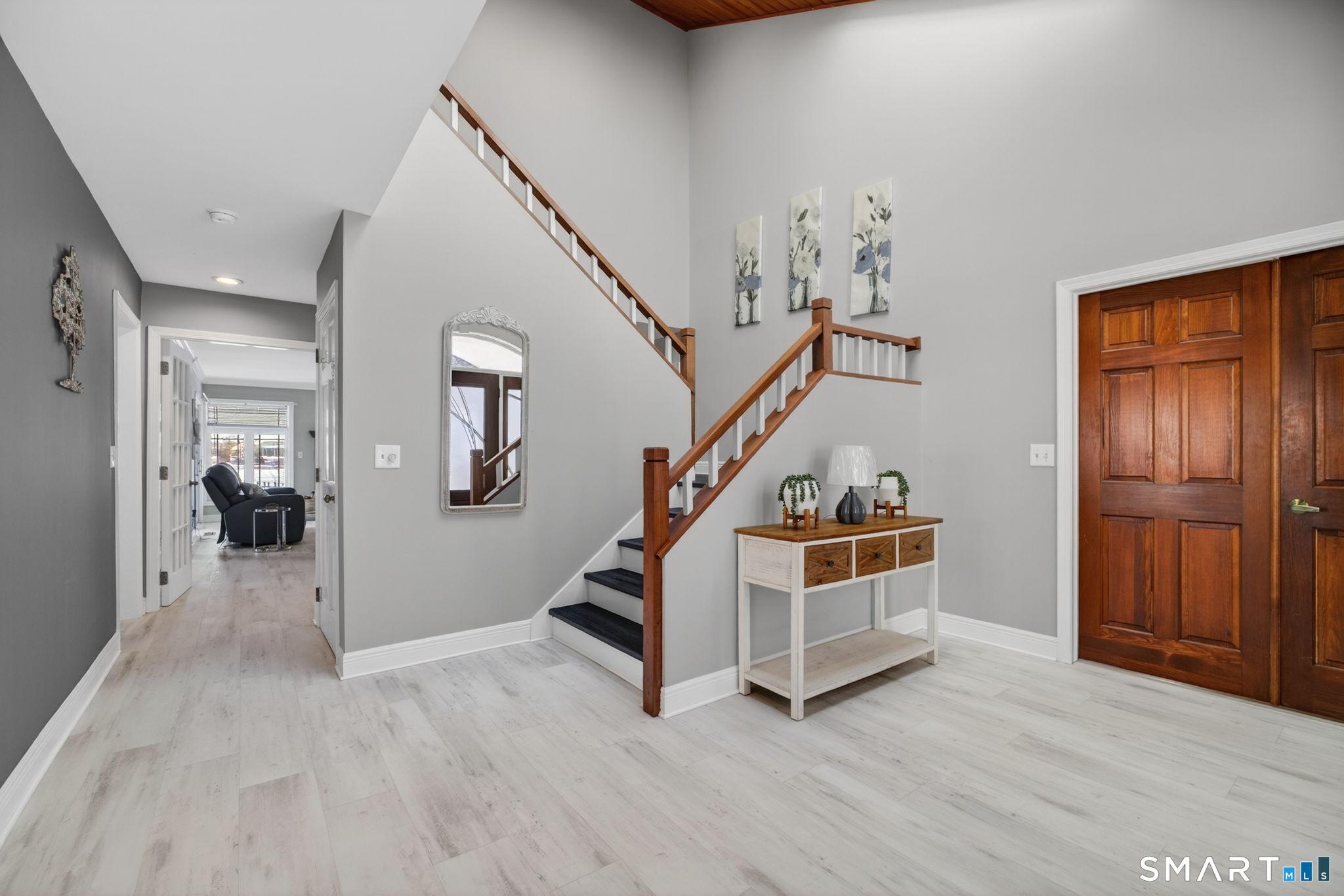Image 2: Spacious Foyer. New Luxury Vinyl Tile Flooring.
