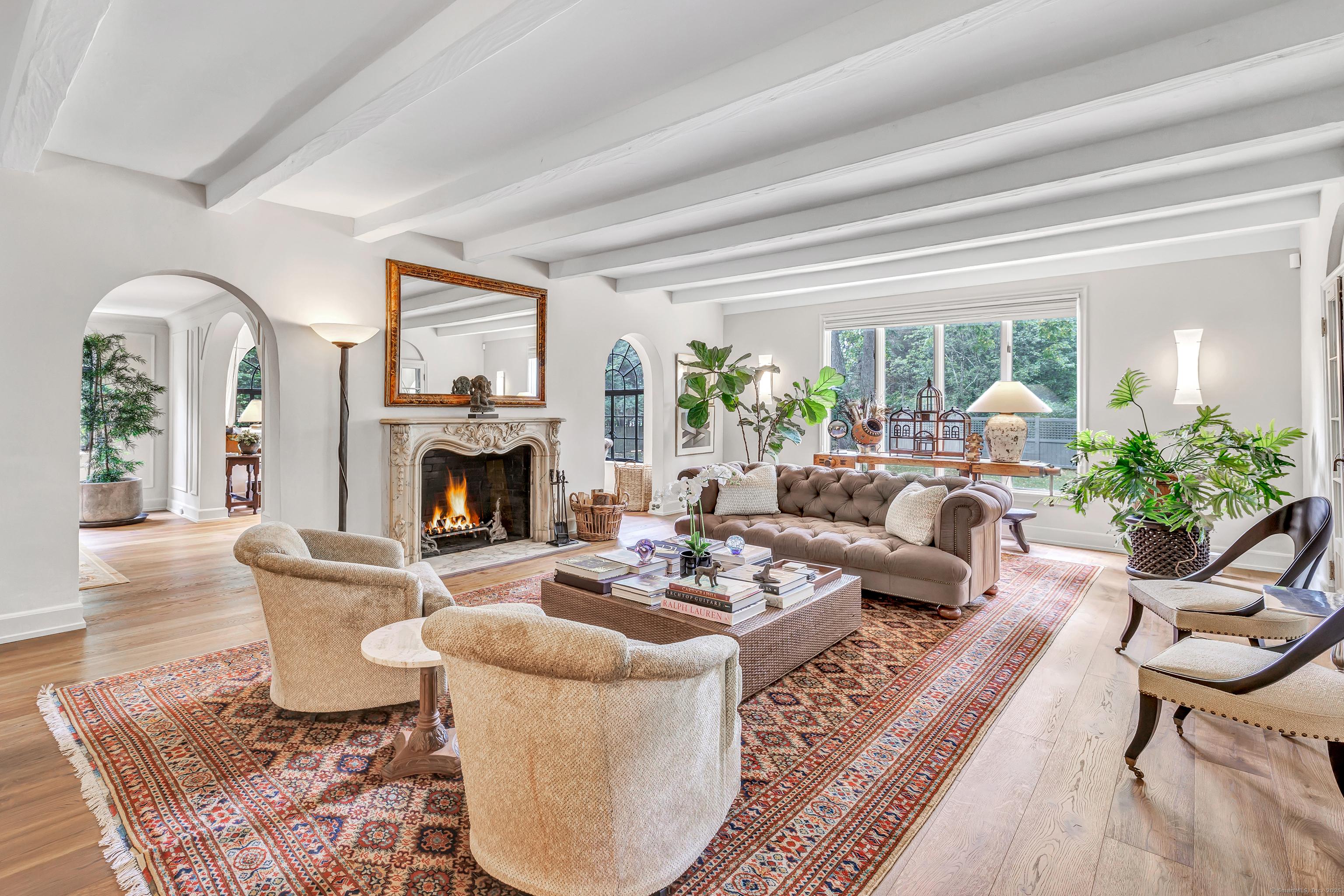 Image 1: Sophisticated spaces throughout the first floor.