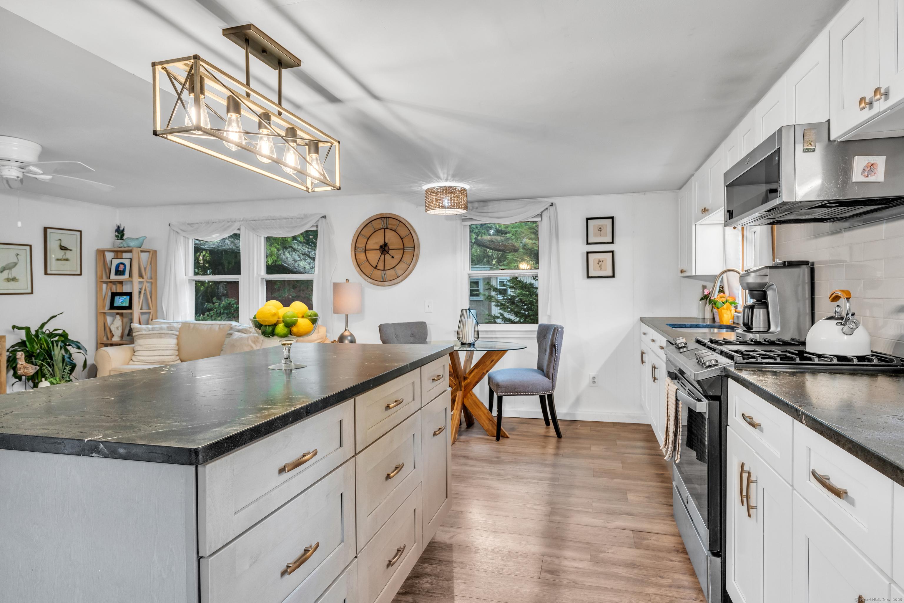 Image 4Kitchen: Large Island with Black Diamond Leatherette Quartzite Countertops