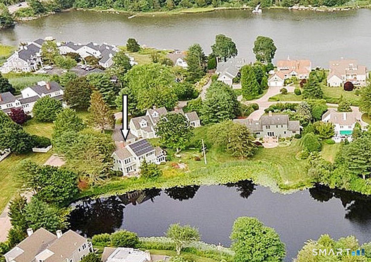 Image 1: Direct Waterfront on Quanaduck Pond from this 3 Bedroom, 4 Full Bath Contemporary Colonial.