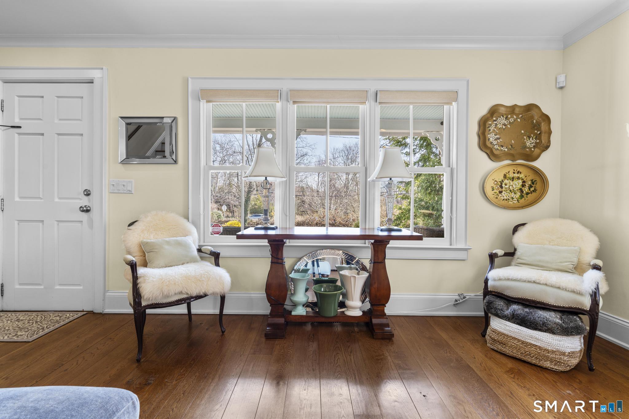 Image 4: Gracious entry with front porch views and beyond.