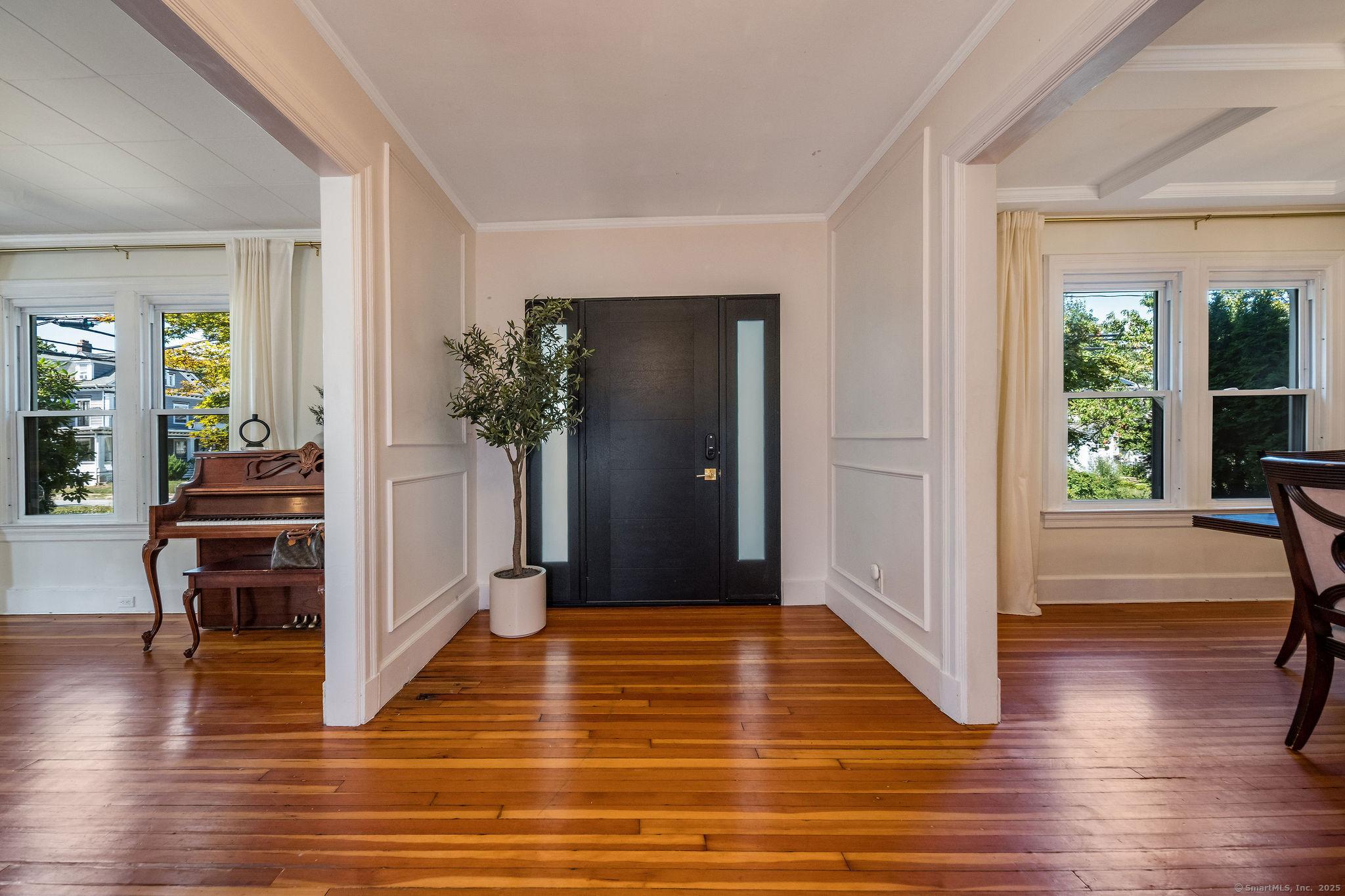 Image 3: Note the gorgeous new front door.
