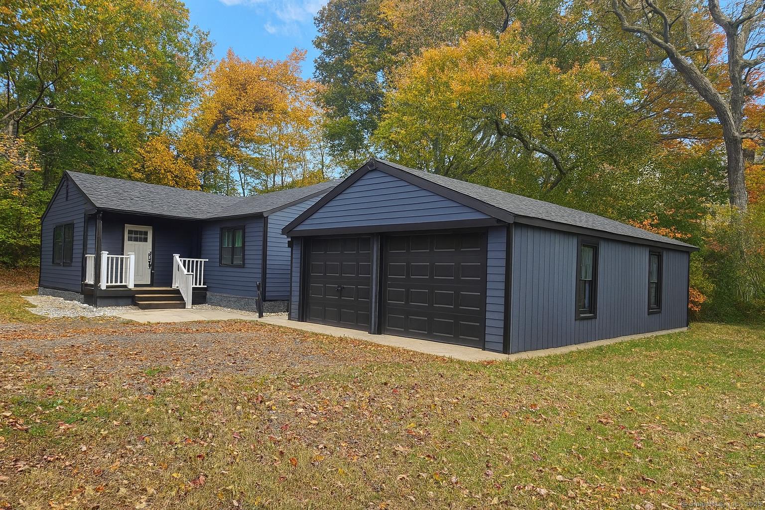 Image 2: Newer roof & siding!