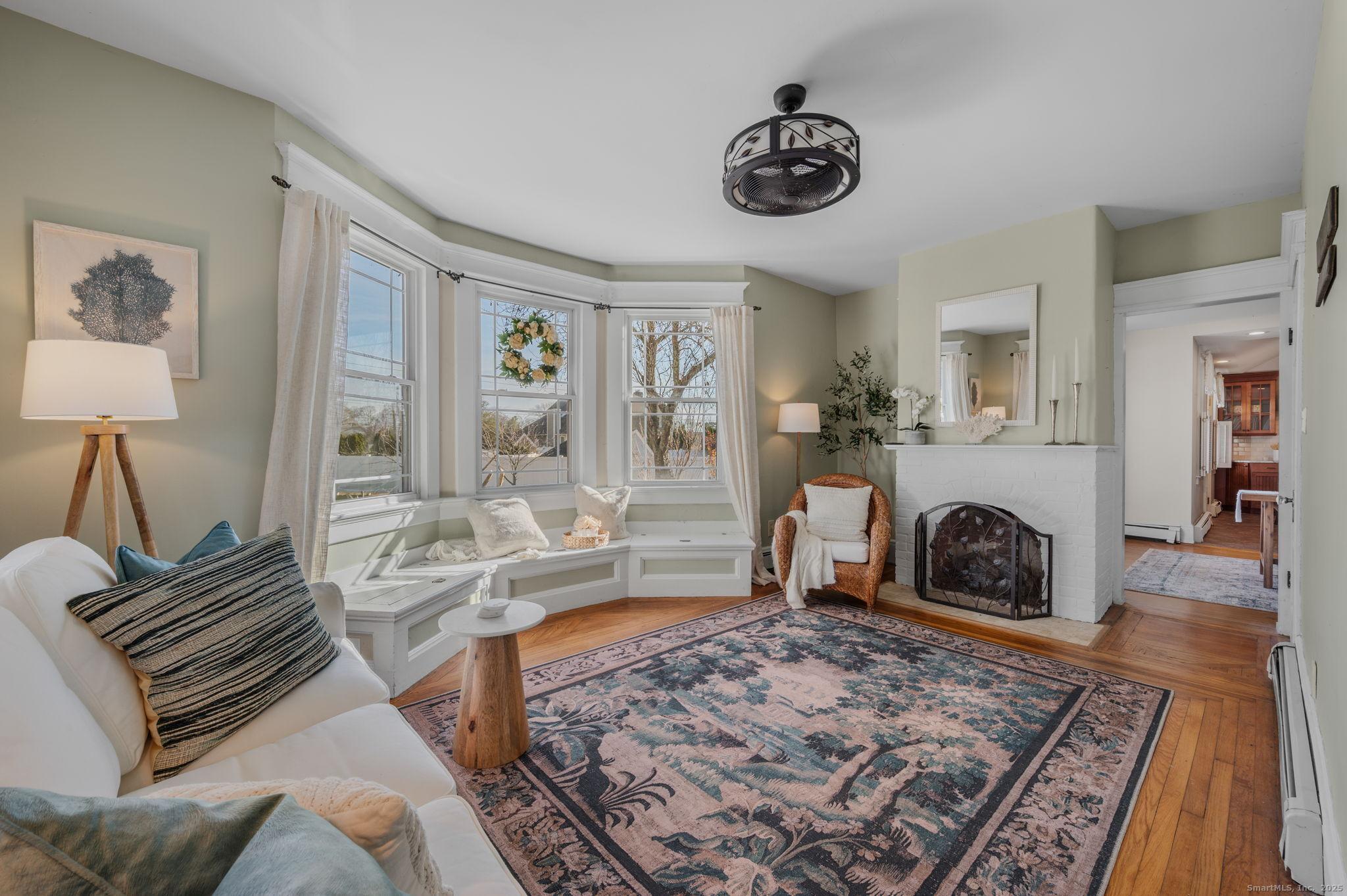Image 4Living Room: Living room opens to dining room creating an airy, connected space