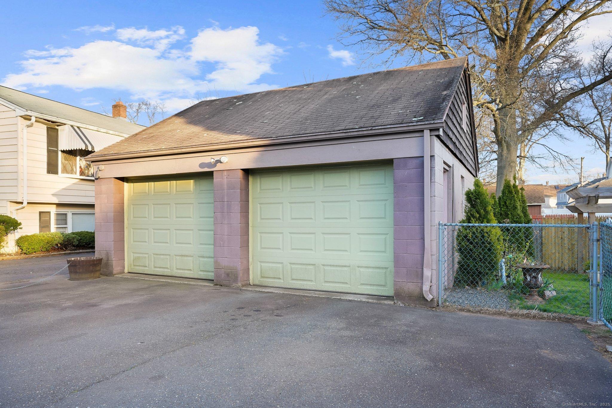 Image 4Garage: TWO CAR GARAGE with second floor storage/expansion possibilites! 