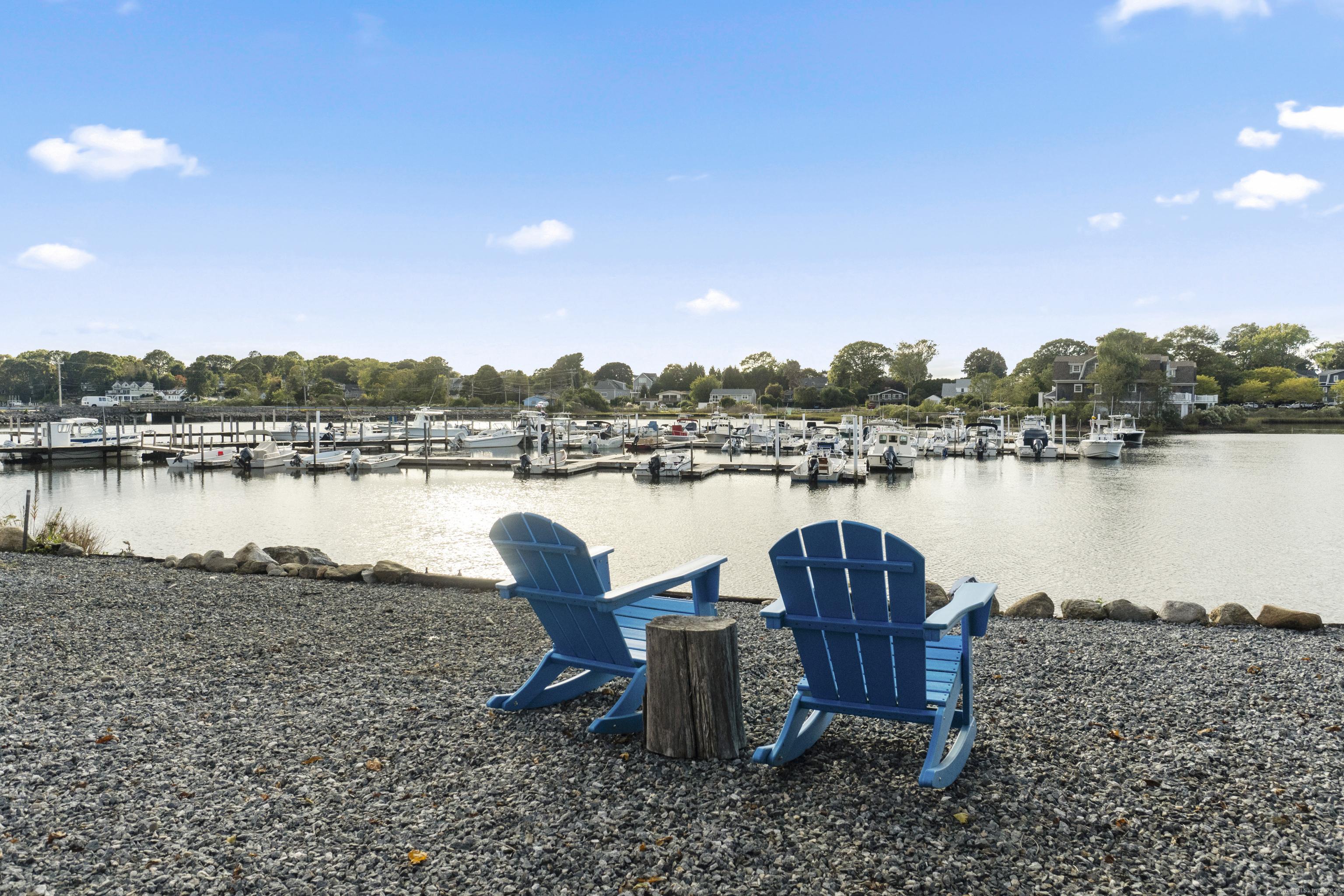 Image 1: This Direct Waterfront parcel on Masons Island Road is included. .08 Acres of land with 50' of frontage on the Mystic River. Drawings available for dock.