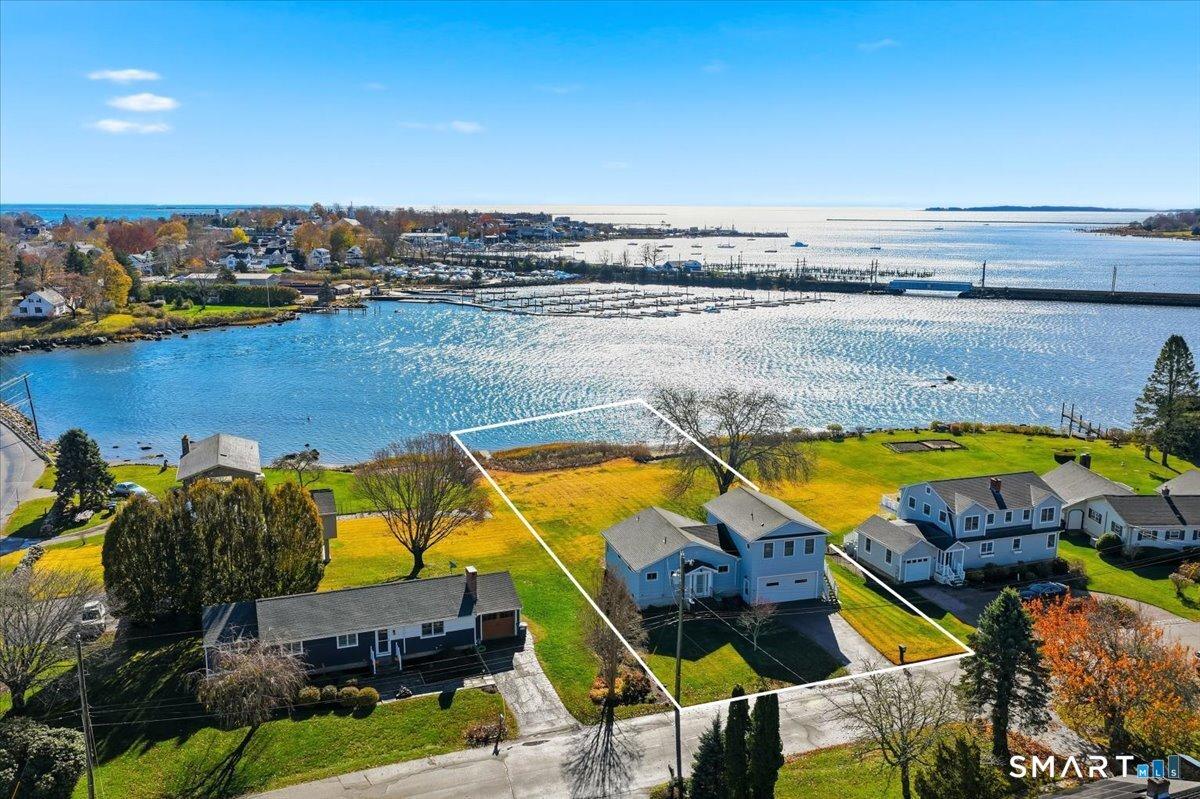 Image 1Aerial View: Direct waterfront on Lamberts Cove with a small dock.