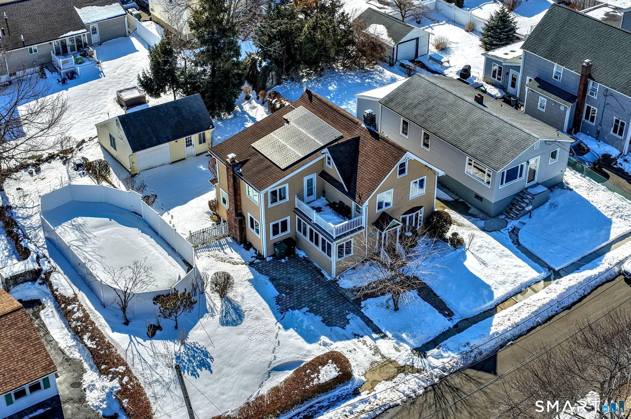 Image 4Aerial View: winter aerial house, garage, pool