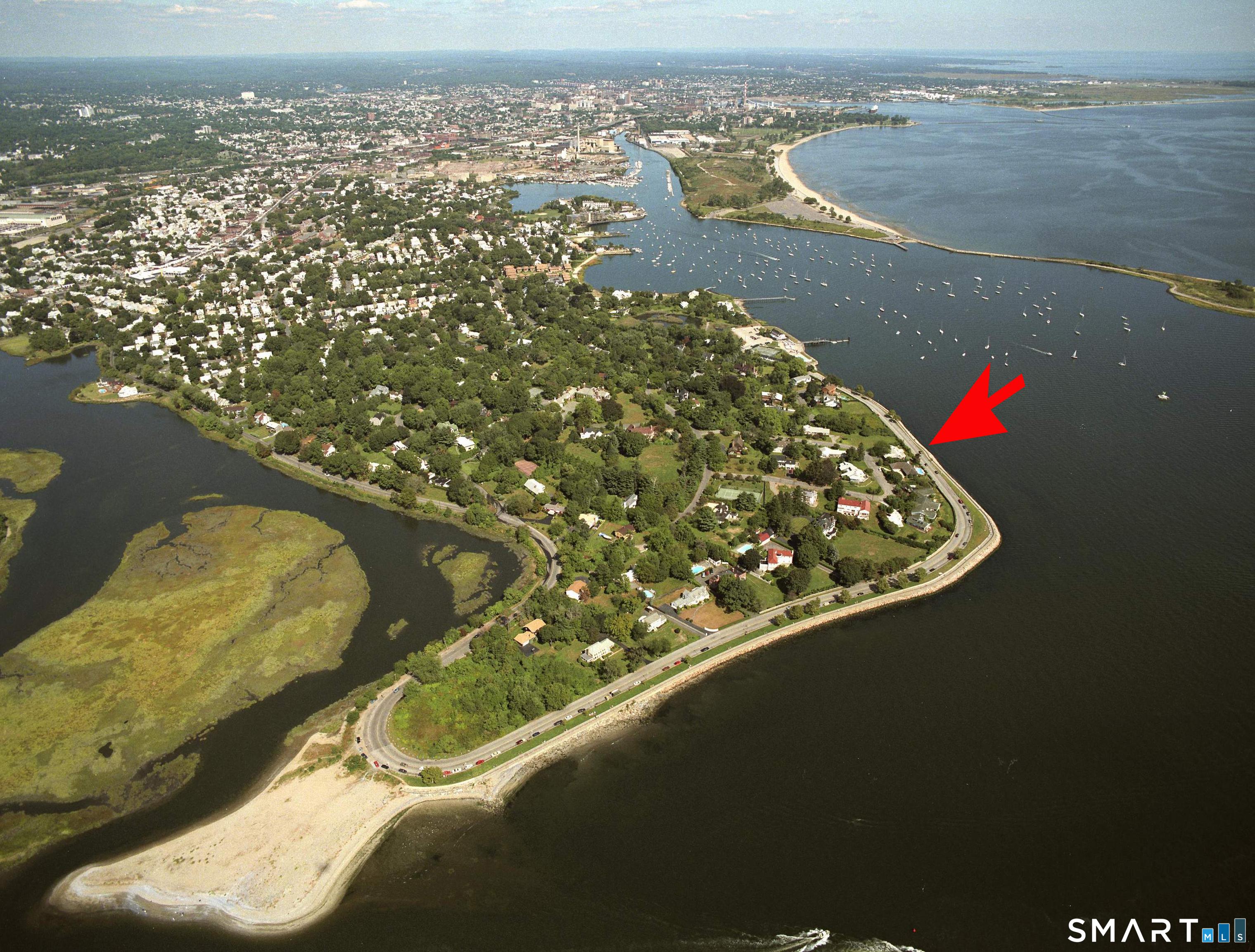 Image 4Aerial View: Arrow points to location of the home at St. Mary's-by-the-Sea in the Black Rock section of Bridgeport. The home is located on Grovers Hill above the flood plain. Walk to Black Rock Yacht Club.