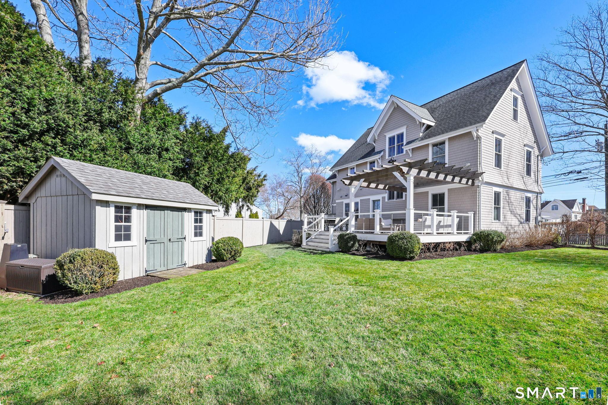 Image 3Back Yard: Uniquely situated on 1/4 acre corner lot so that you have breathing room on all 4 sides