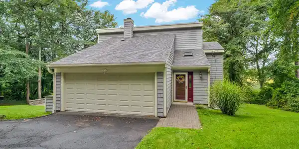 Image 3: Two car garage for convenient parking - and located on a double lot for even more possibilities! 