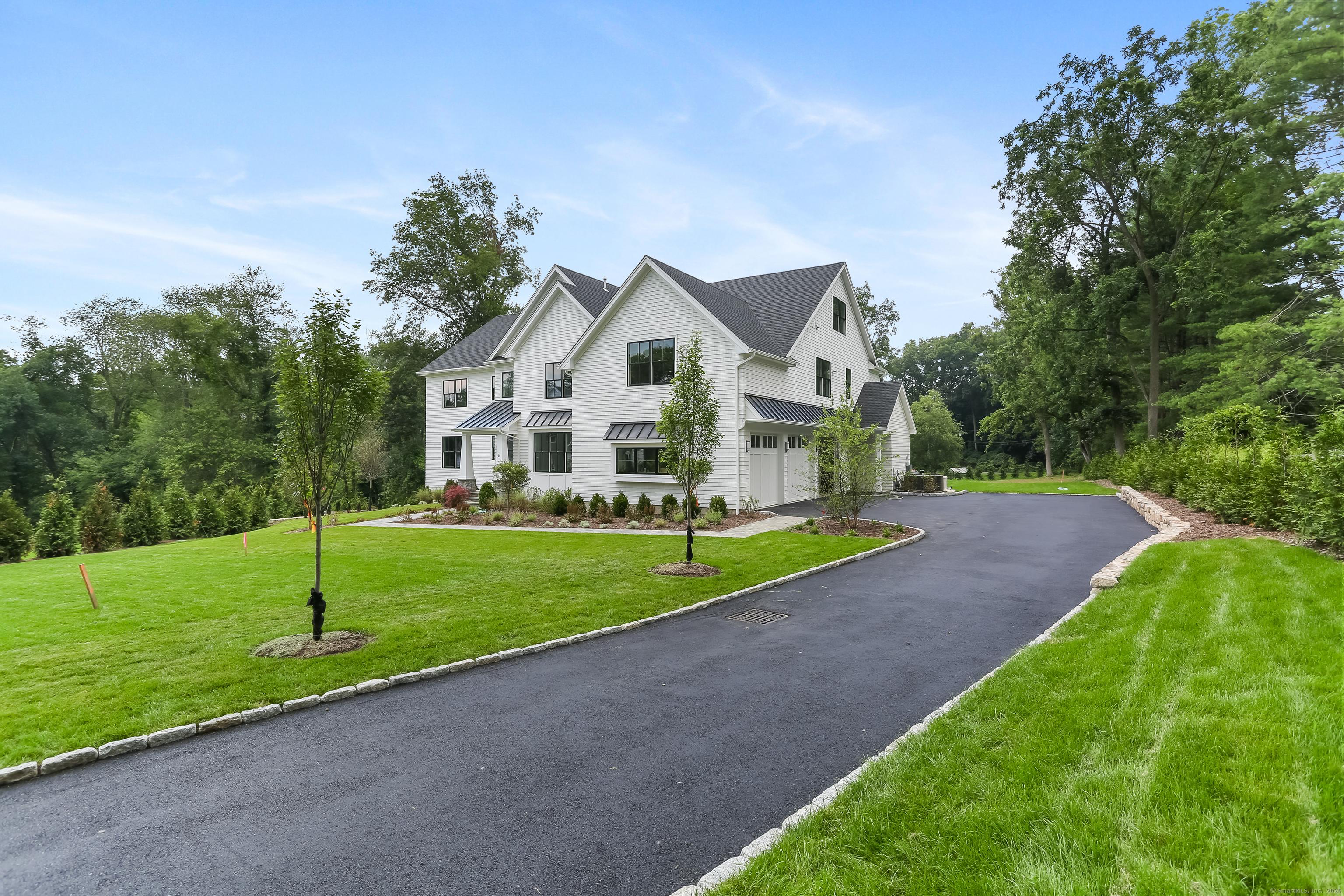 Image 3Front of House: Classic Greens Farms setting