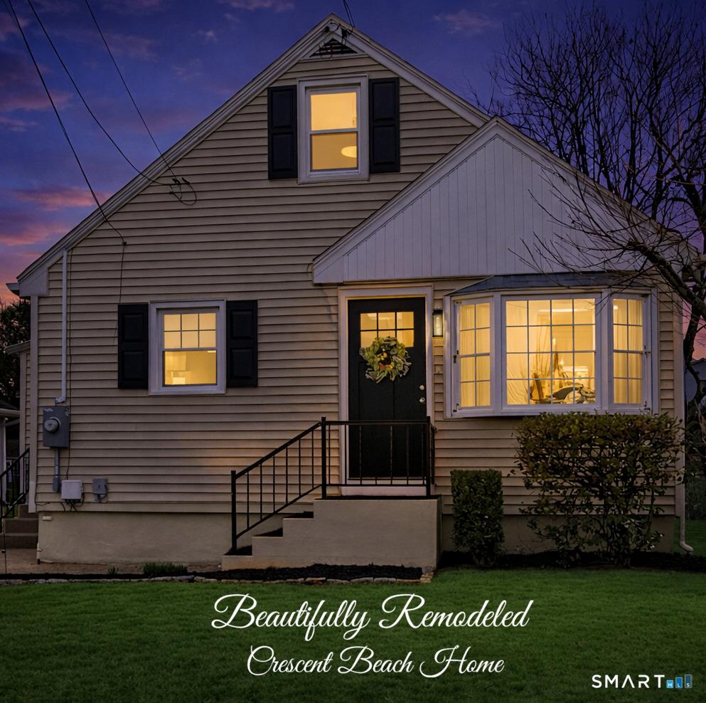 Image 1Front of House: Welcome to your beautifully remodeled Crescent Beach home!