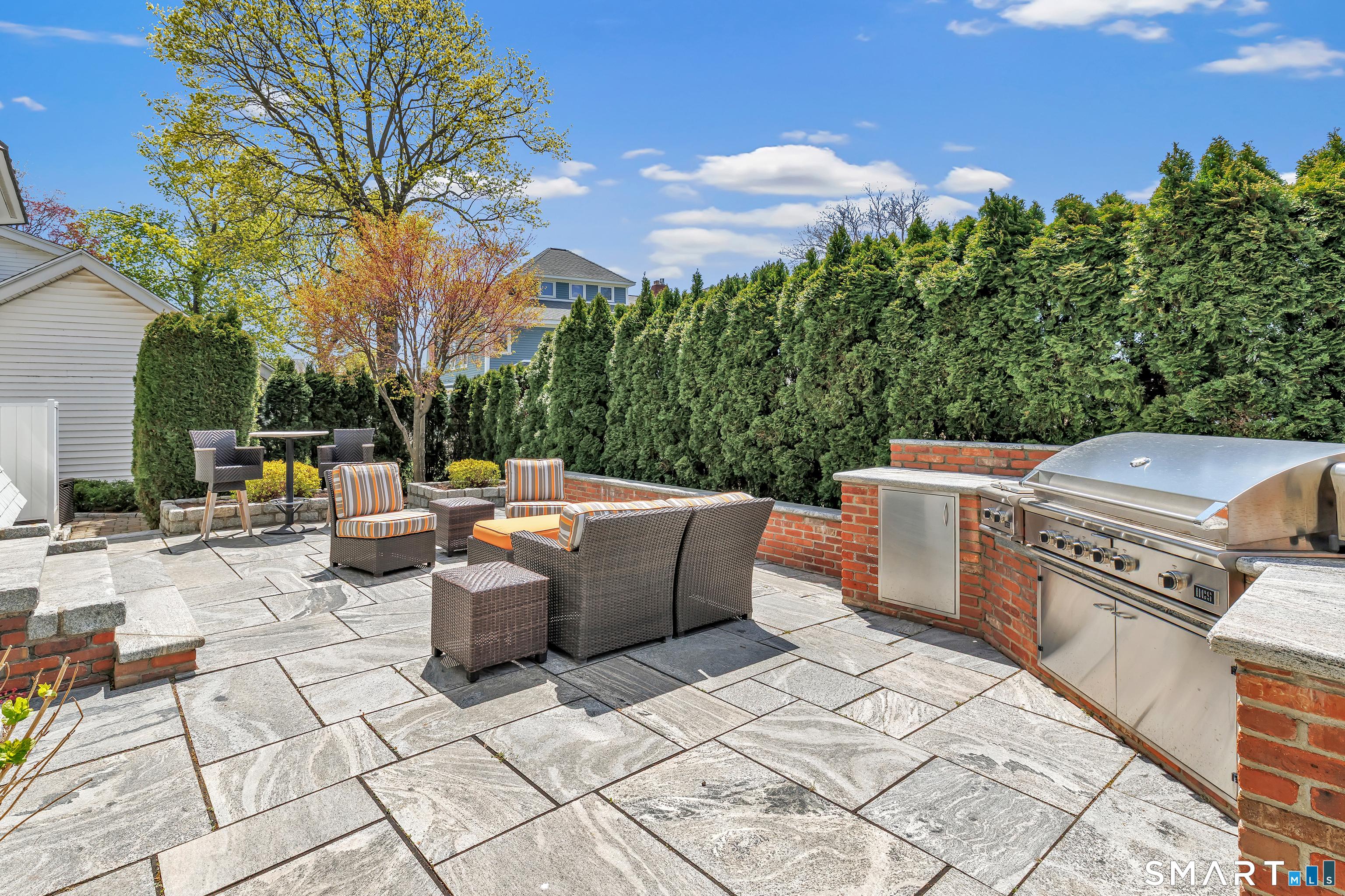 Image 3: The Private Stone Patio sits directly off the kitchen.