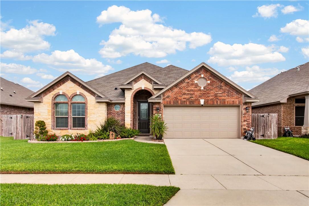 Image 1: With its attractive stone-and-brick exterior, mani