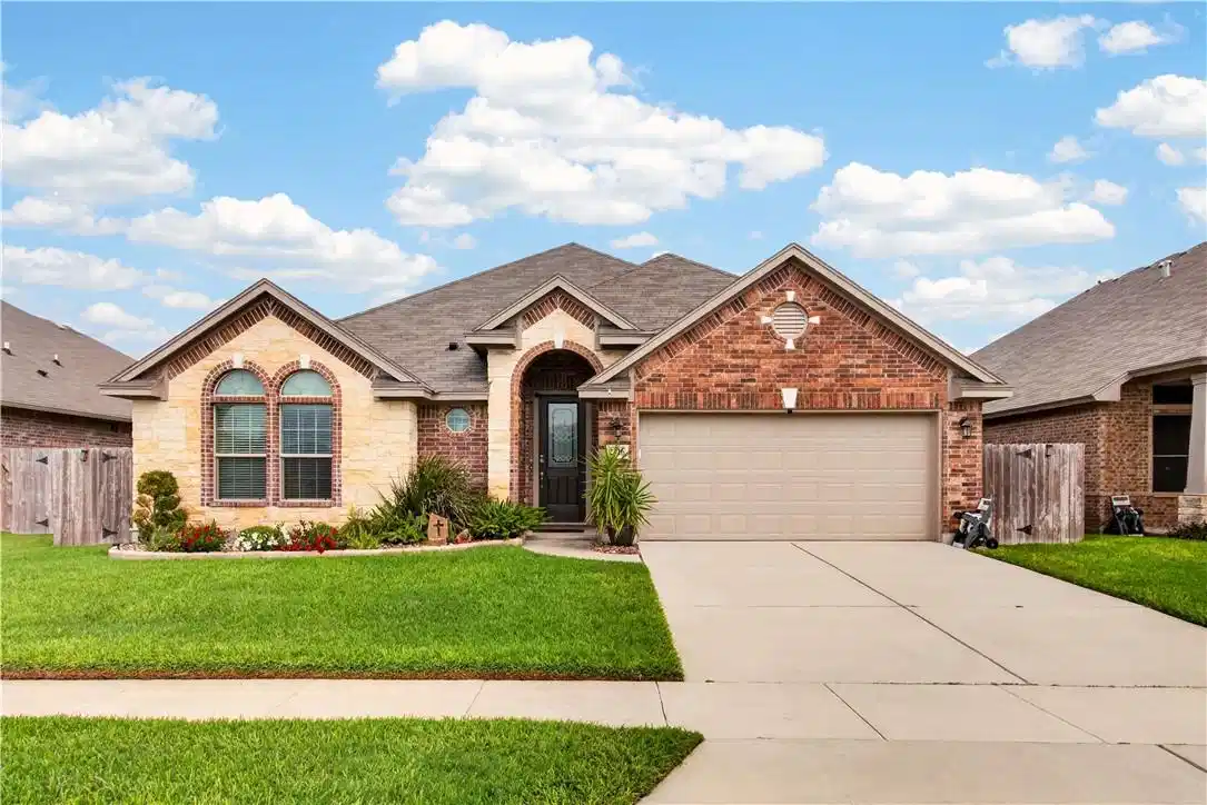 Image 1: With its attractive stone-and-brick exterior, mani