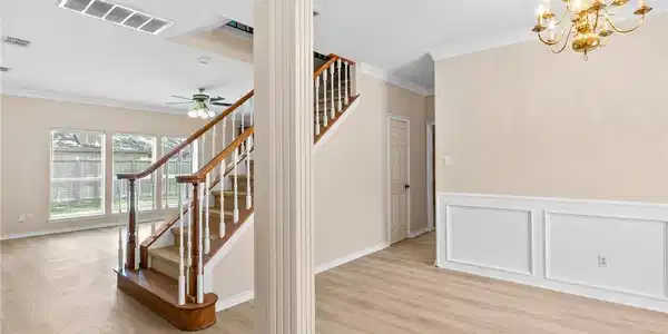 Image 4: Looking in from front Door, Living Opposite Side o