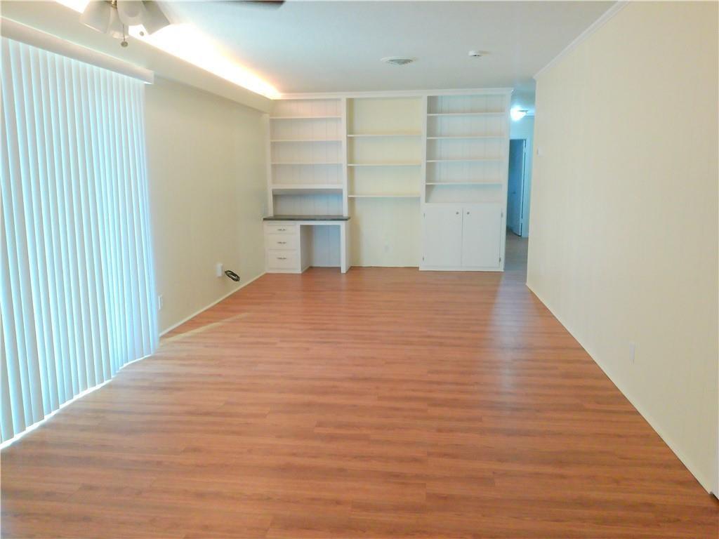 Image 4: From the entry step into the family room which ove