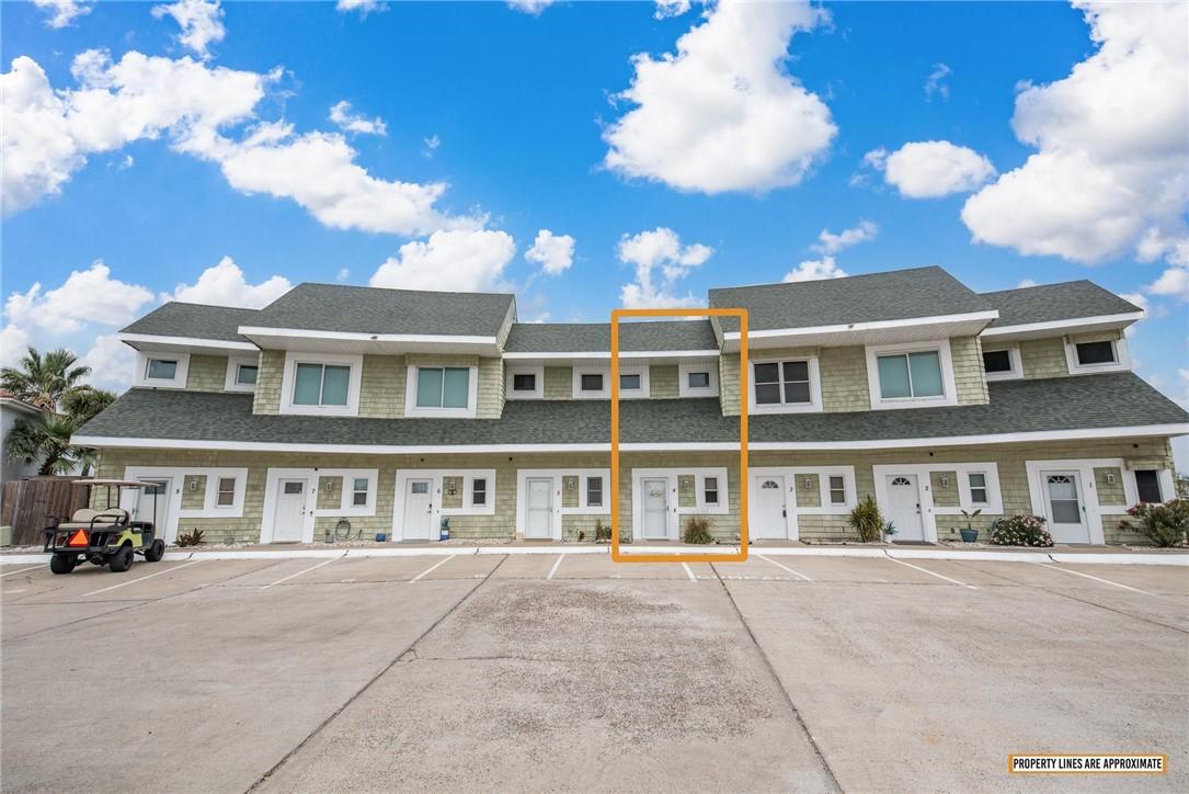 Image 3: Unit 104 - 2-story, one assigned parking space and