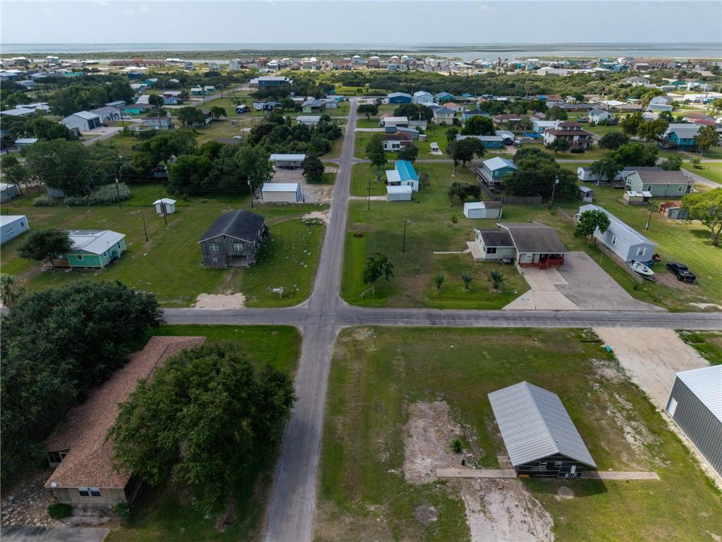 Image 3: Aerial View of the Lot with Storage Building