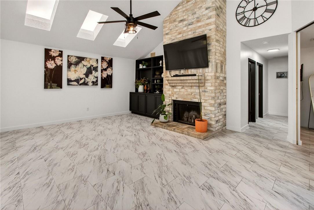 Image 2: Recently updated flooring and fixtures throughout.