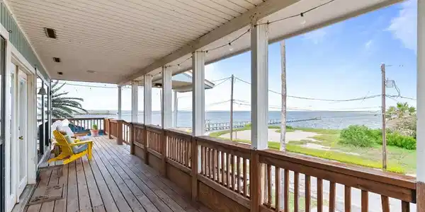 Image 2: Wrap around porch that goes the full length of the