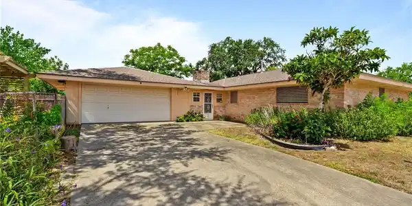 Image 3: Garage and door to bonus room