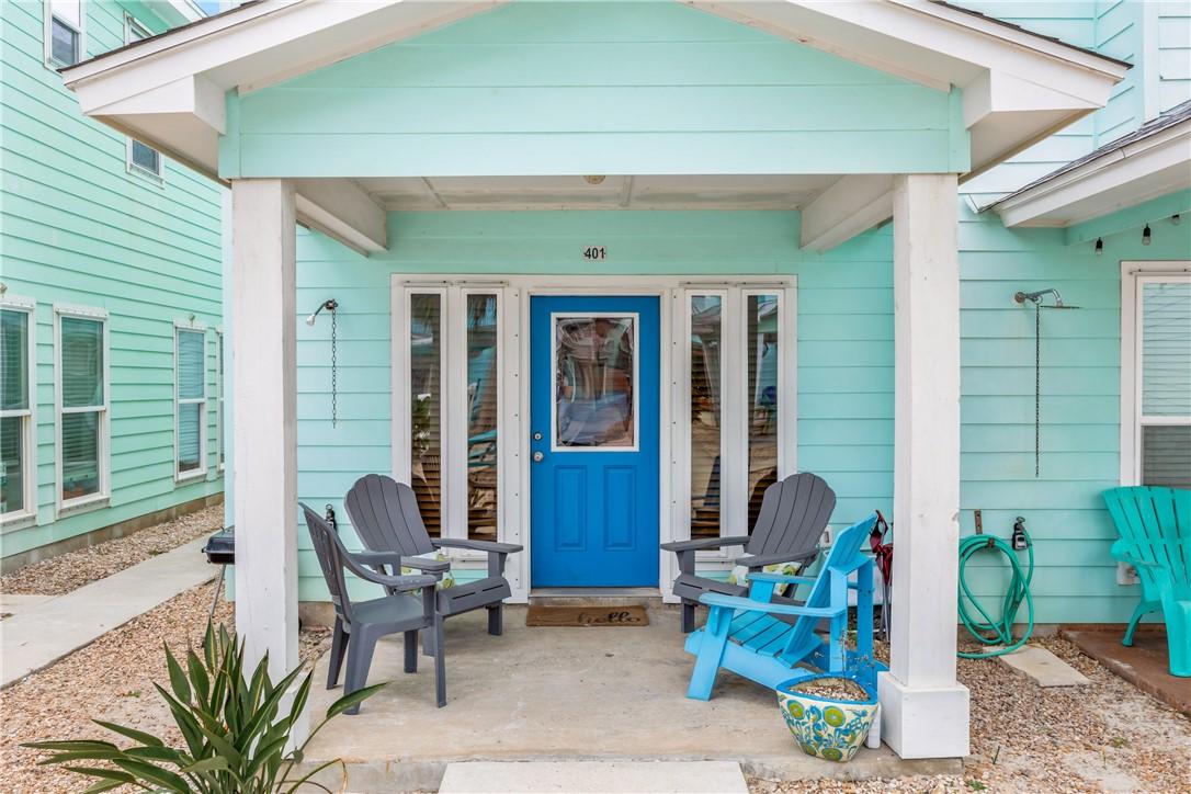 Image 3: #401 is an end unit close to the community pool