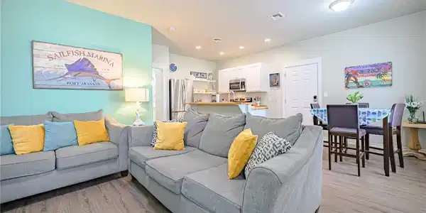 Image 2: Open-concept living space designed for guest comfo