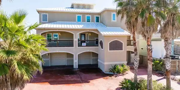 Image 2: Ample parking with room for 6+ cars. Landscaped wi