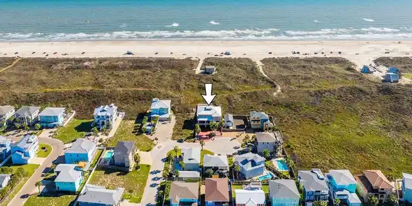 Image 3: The aerial view shows the neighborhood and proximi