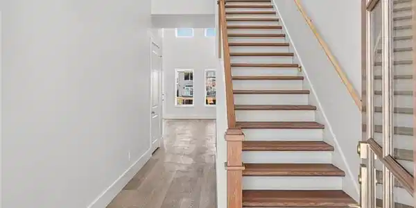 Image 4: Entry with grand chandelier & upgraded LVT plank