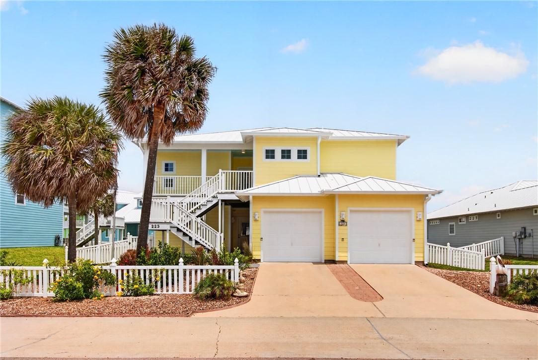 Image 2: 223 Keewaydin offers two car garage and exterior d