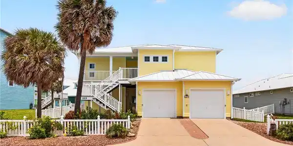 Image 2: 223 Keewaydin offers two car garage and exterior d