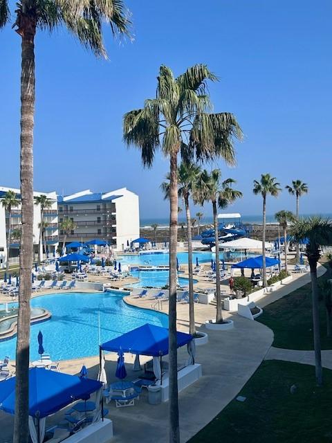 Image 2: This unit faces the pool and ocean