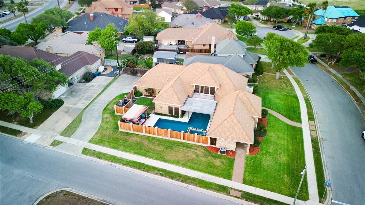 Image 3: Located on corner lot with garage in back provides