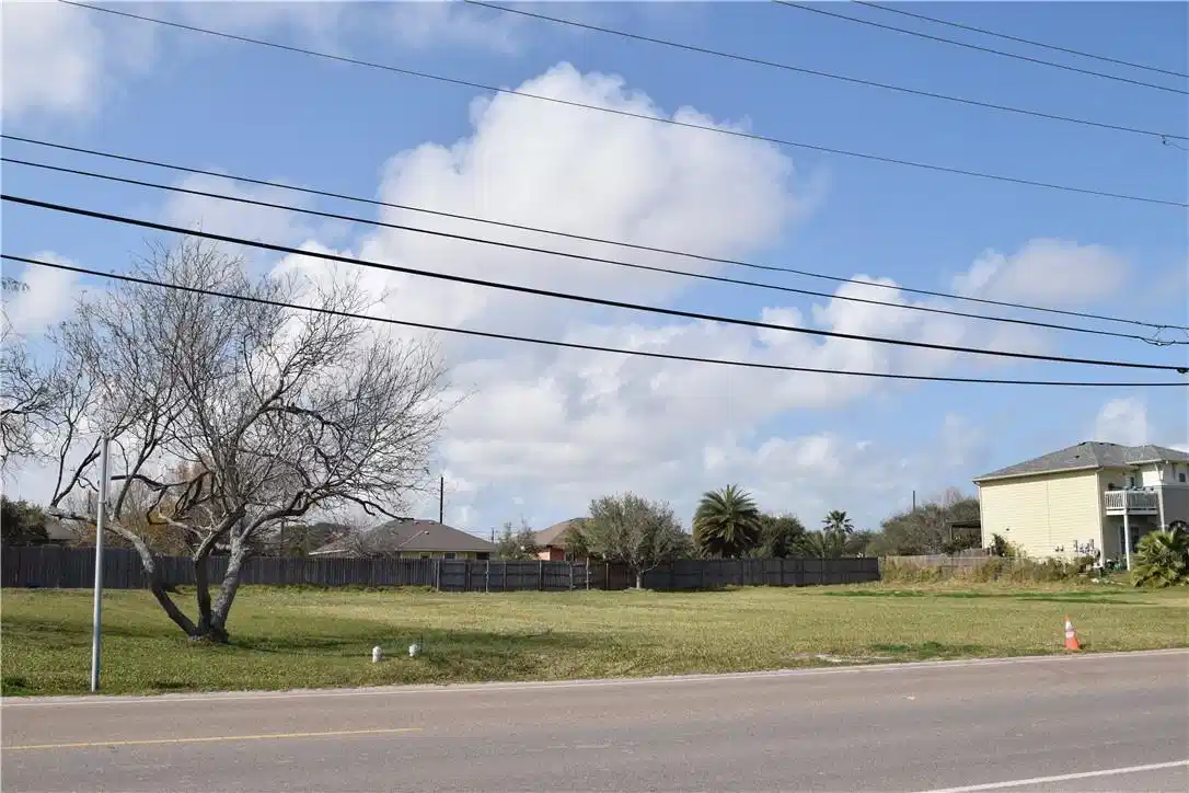 Image 1: One of three lots, this one is closest to the tree
