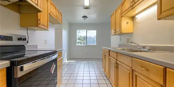 Image 4: Kitchen with new stove (2025) in Rockport Texas ho