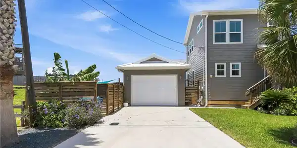 Image 4: Garage has room for one car and golf cart. Multipl