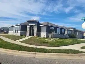 Image 1: Corner lot