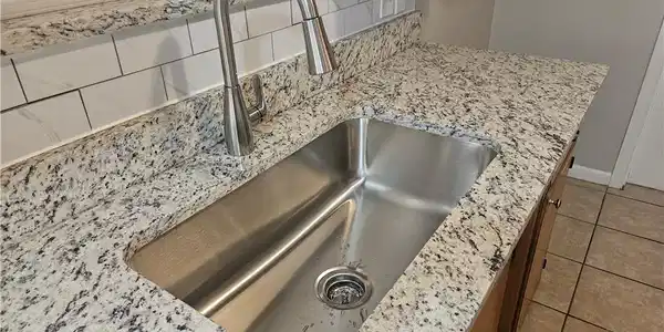 Image 4: New Granite, Sink and Faucet, plus Range Oven