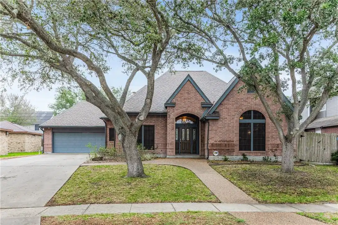Image 1: Custom,Traditional Brick Home with European Charac
