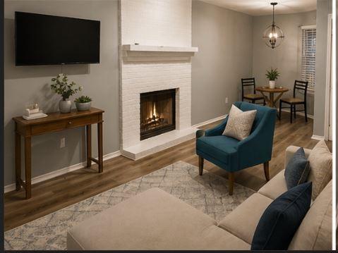 Image 2: Dining and Living Room with Fireplace