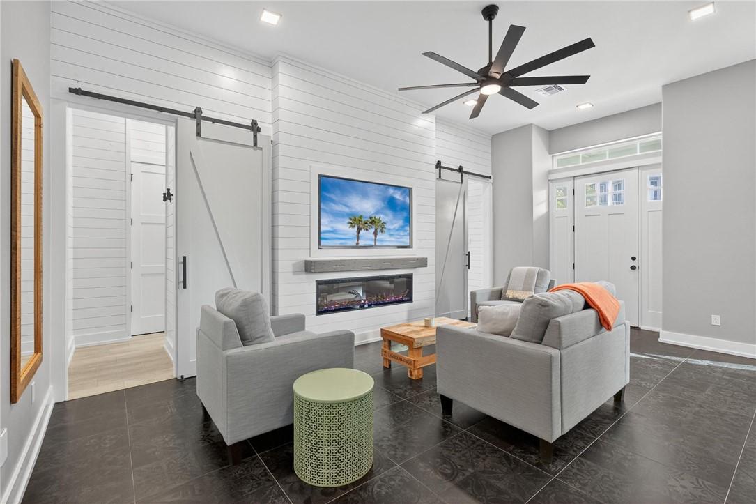 Image 4: Front Door to Living and Walk-Through Bunk Room!