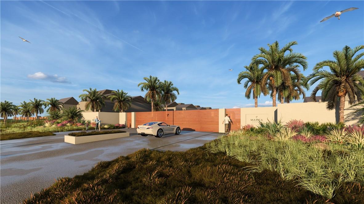 Image 3: The gated entry welcomes owners and guests into Ma